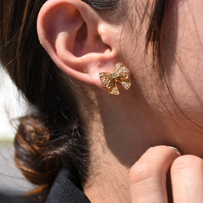 Boucles d'oreilles nœud charmantes